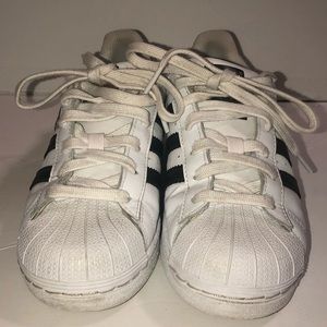 White with black 3 stripe shell toe adidas